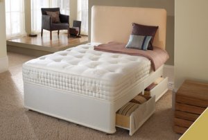Slumberland 2400 gold seal double divan bed, with 2 drawers, padded headboard and posture sprung mattress.