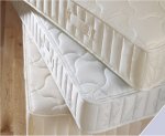 Slumberland de-luxe mattresses, with posture springing.
