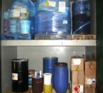 Disposal of plastic and metal drums containing a variety of hazardous materials.