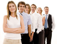 Image of 6 young men and women standing in a line, representing a happy successful young business.