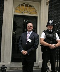 Darren Hesketh and Policeman outside No. 10 Downing Street.